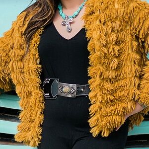 Fuzzy mustard yellow jacket. Small. Never worn, no tags.